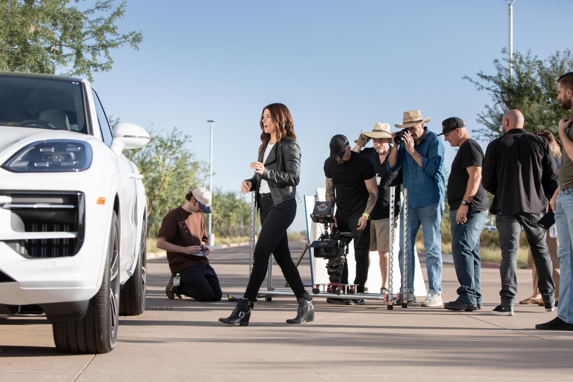 Film crew setting up outdoor scene showing how to plan a successful video shoot. 