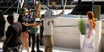 Local video production crew filming outdoor scene