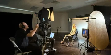 Studio with camera and lighting equipment.